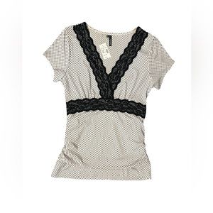 NWT Medium size Maurice’s black and white blouse with black lace.